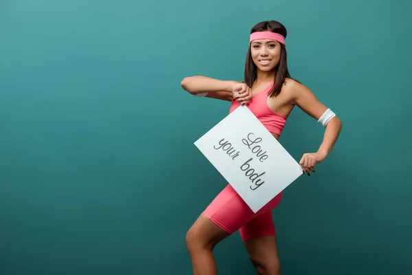 African American Sportswoman Smiling Presenting Placard Love Your Body Inscription — Stock Photo, Image