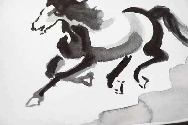 Paper with japanese painting with grey horse