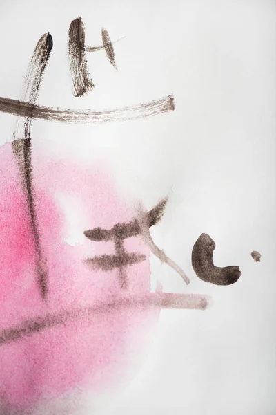 Japanese painting with hieroglyphs painted with grey and pink watercolor on white