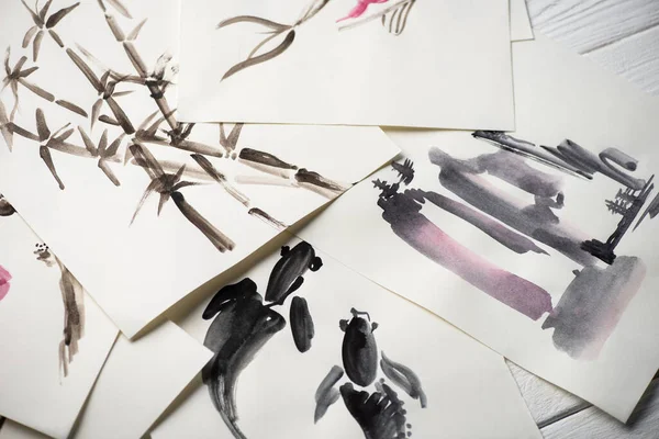 Bovenaanzicht Van Papier Met Japanse Schilderkunst Houten Ondergrond — Stockfoto