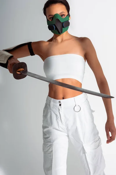 Futuristic African American Woman Safety Mask Sword White Background — Stock Photo, Image