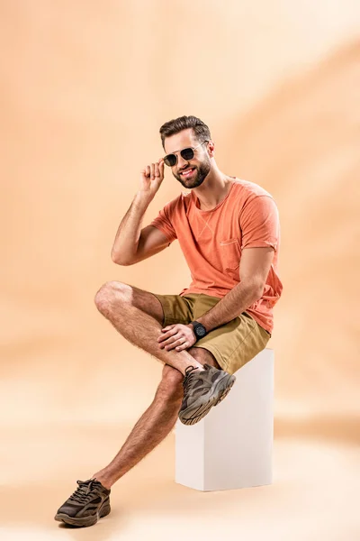 Smiling Handsome Young Man Shorts Summer Shirt Sunglasses Sitting White — Stock Photo, Image