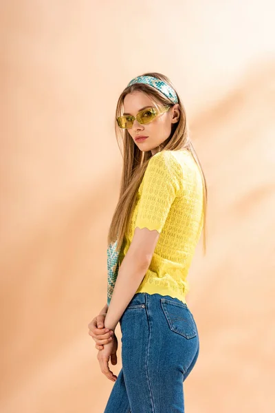 Attractive Girl Posing Jeans Yellow Shirt Sunglasses Silk Scarf Beige — Stock Photo, Image