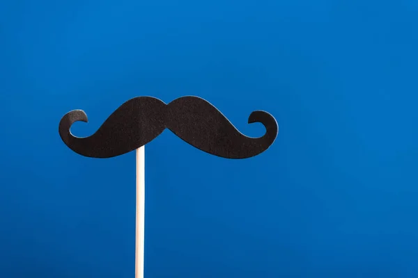 Decorative Black Paper Fake Mustache White Stick Isolated Blue — Stock Photo, Image