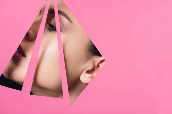 Female Face Triangular Holes Pink Paper — Stock Photo, Image