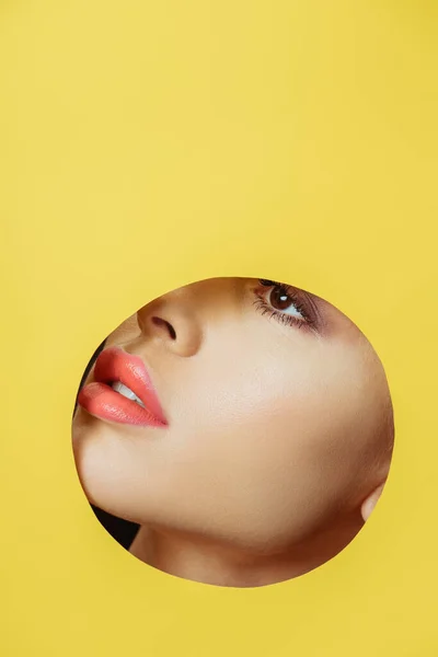 Female Face Coral Lips Hole Yellow Paper — Stock Photo, Image