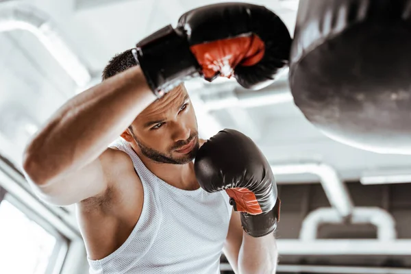 Selective Focus Handsome Sportsman Boxing Gloves Training Punching Bag — Stock Photo, Image