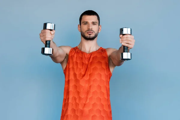 Handsome Sportsman Working Out Dumbbells Isolated Blue — Stock Photo, Image