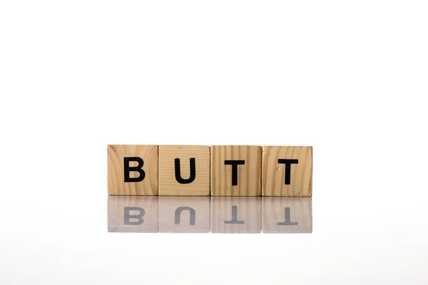 Wooden Cubes Butt Lettering White Background — Zdjęcie stockowe