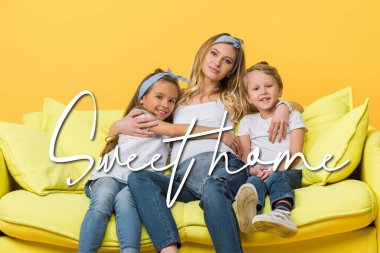 happy pregnant mother hugging with kids on sofa isolated on yellow, sweet home illustration clipart