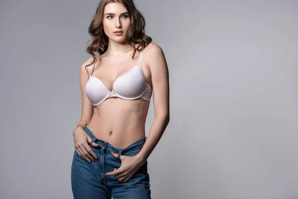 Young Woman Bra Denim Jeans Standing Grey — Stock Photo, Image