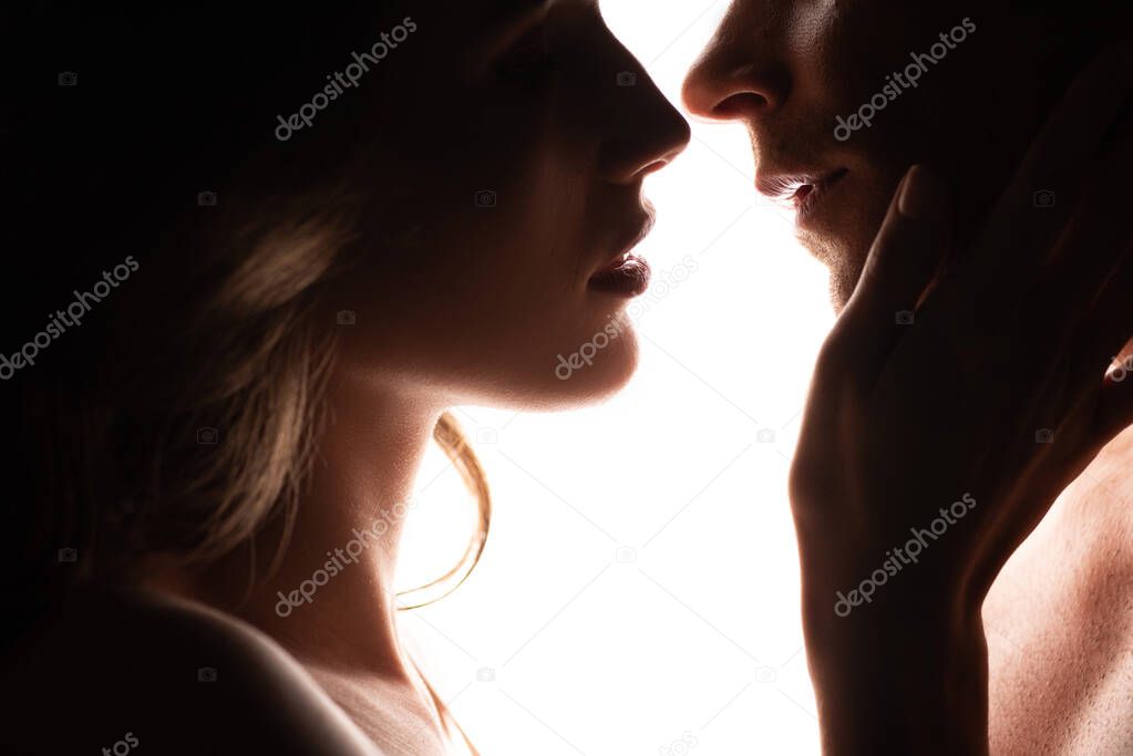 cropped view of woman touching man isolated on white 