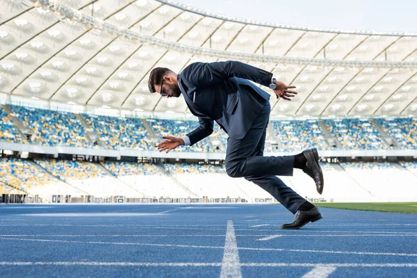 Side View Young Businessman Suit Running Stadium — Stock Photo, Image