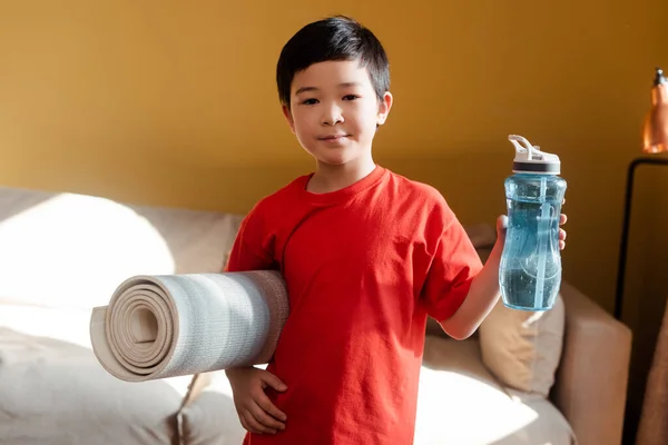 Sportive Asian Child Holding Sports Bottle Fitness Mat Home Self — Photo