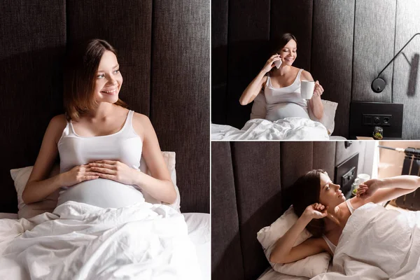 照片中快乐的孕妇在卧室里一边举杯一边用智能手机交谈 — 图库照片