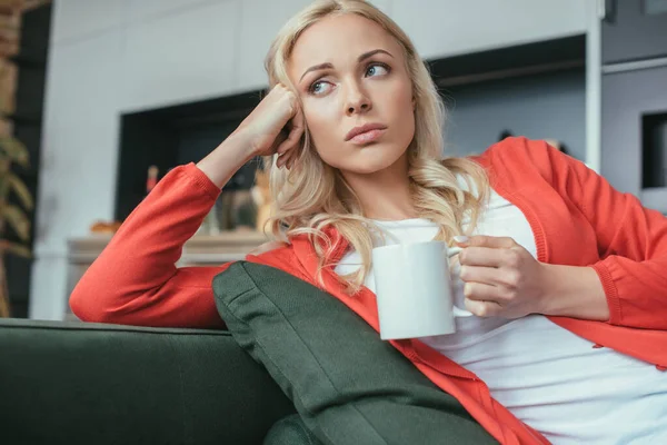 Sad Woman Looking Away While Sitting Couch Cup Tea — Stock Photo, Image