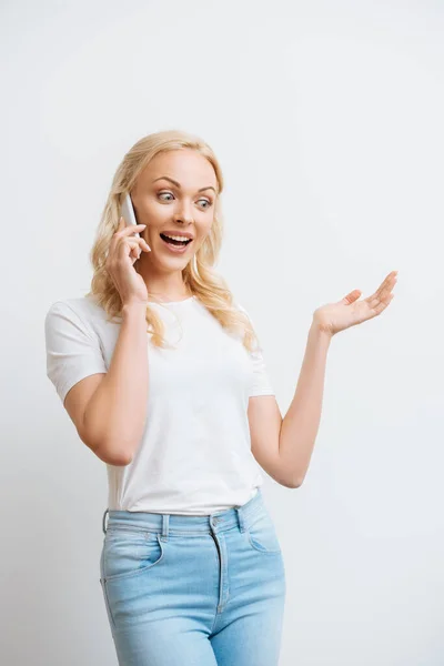 Happy Woman Talking Smartphone While Standing Open Arm Isolated White — Stock Photo, Image