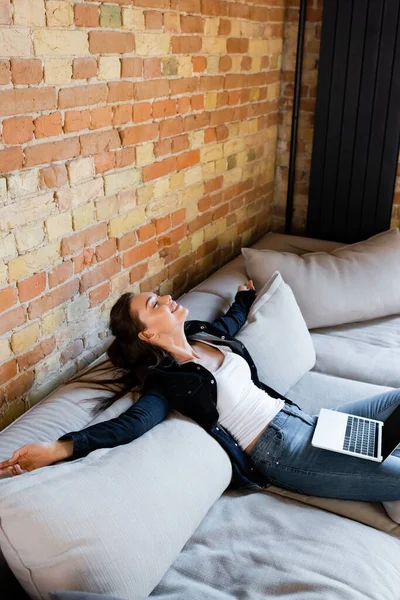 Cheerful Freelancer Closed Eyes Relaxing Sofa Laptop — Stock Photo, Image