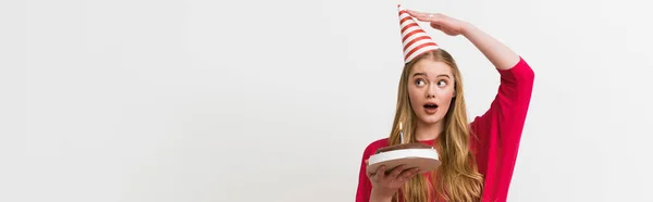 Panoramic Concept Surprised Girl Touching Party Cap Holding Birthday Cake — Stock Photo, Image