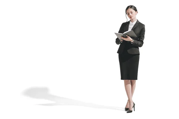 Businesswoman holding diary — Stock Photo
