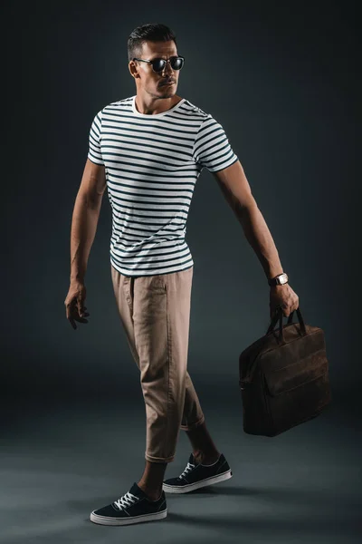 Stylish man with leather bag — Stock Photo