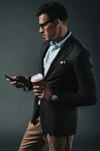 Businessman using smartphone — Stock Photo