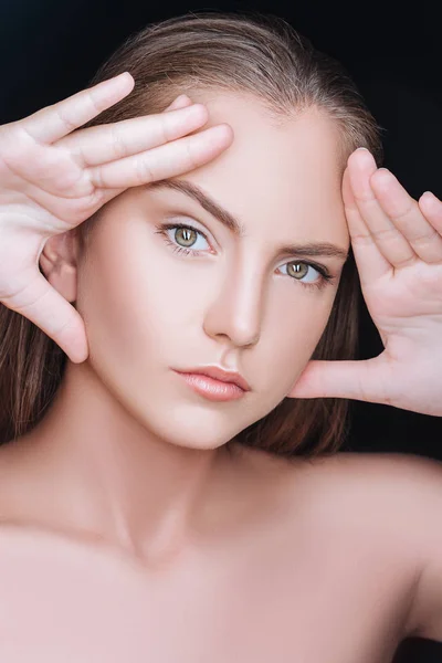 Beautiful woman with hands near face — Stock Photo