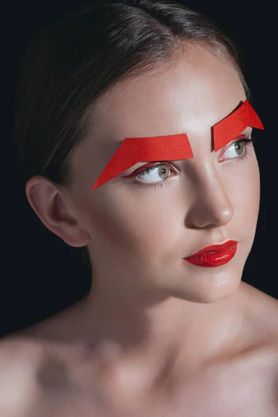 Beautiful woman with paper eyebrows — Stock Photo