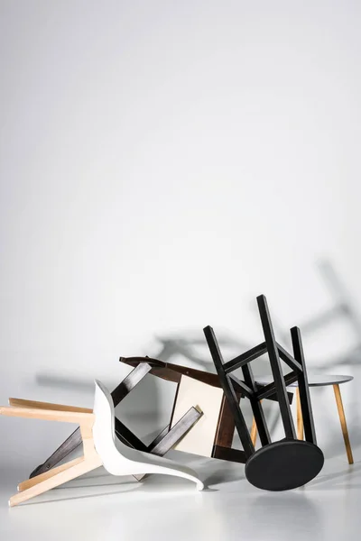 Pile of stylish chairs — Stock Photo