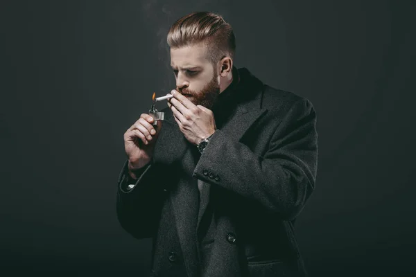 Stylish man smoking cigarette — Stock Photo