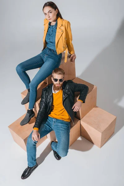 Stylish couple in leather jackets and jeans — Stock Photo