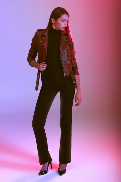 Stylish girl in leather jacket — Stock Photo