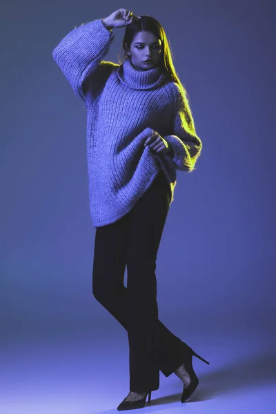 Stylish girl in warm sweater — Stock Photo