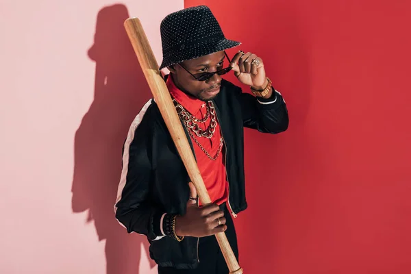 African american man with bat — Stock Photo