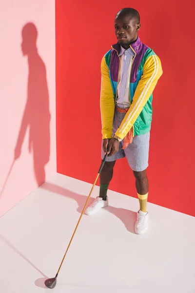 Stylish man with golf club — Stock Photo