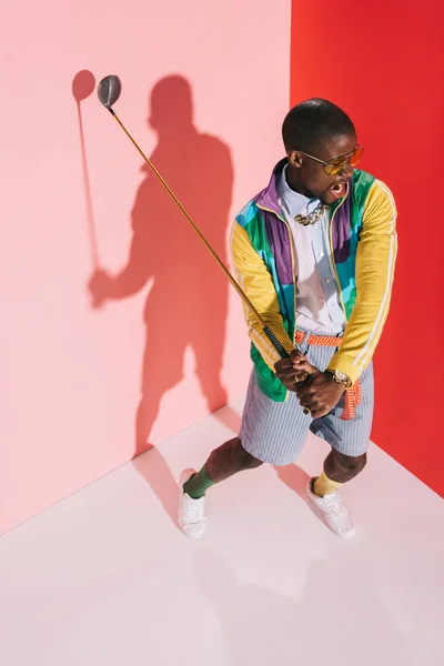 Stylish man with golf club — Stock Photo