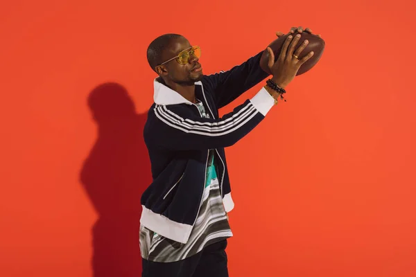 African american man with rugby ball — Stock Photo