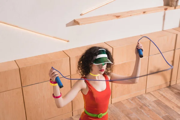 Woman exercising with skipping rope — Stock Photo