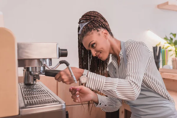 Barista making coffee with machine — Stock Photo