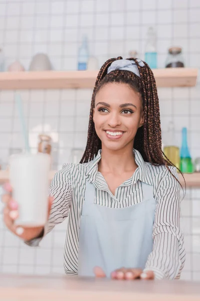 Barista handing coffee — Stock Photo