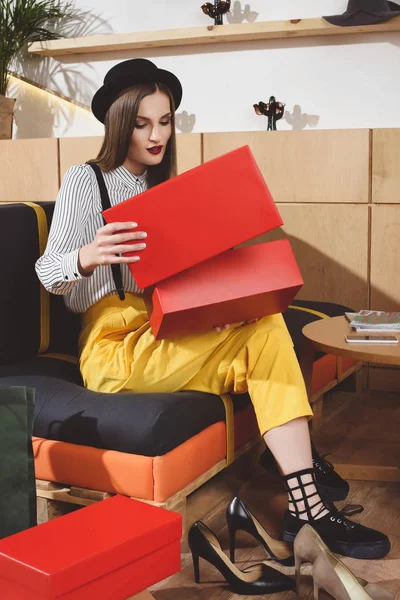 Girl choosing footwear — Stock Photo