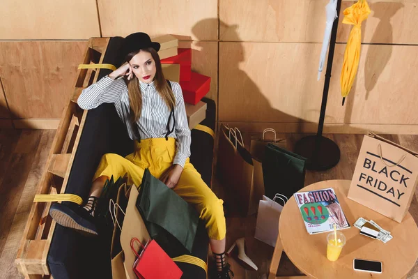 Girl resting after black friday shopping — Stock Photo