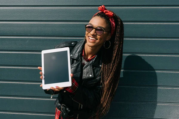 Stylish girl with digital tablet — Stock Photo