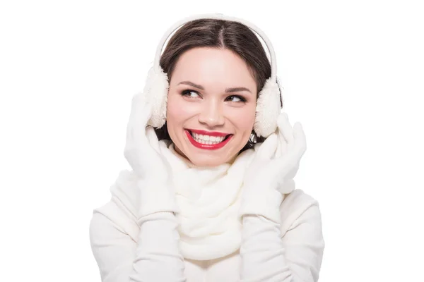 Woman with red lips in earmuffs — Stock Photo