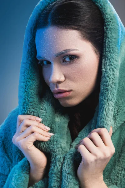 Fashionable woman covered in frost — Stock Photo