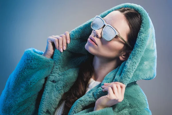 Trendy woman covered in frost — Stock Photo