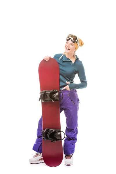 Jeune femme avec snowboard — Photo de stock