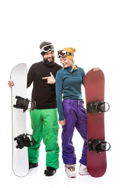 Couple with snowboarders — Stock Photo