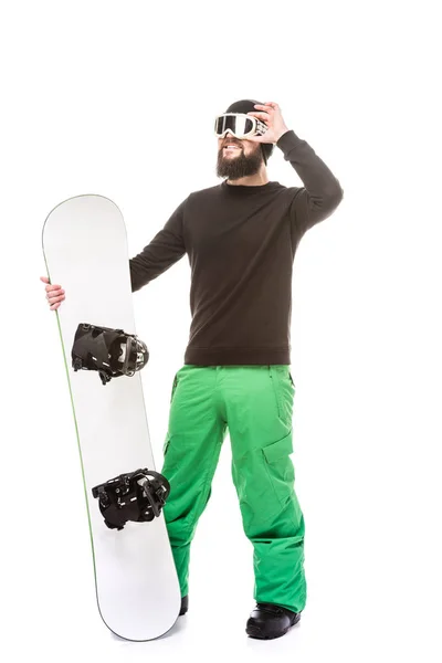 Jeune homme avec snowboard — Photo de stock