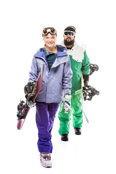 Couple in snowboarding costumes with snowboards — Stock Photo